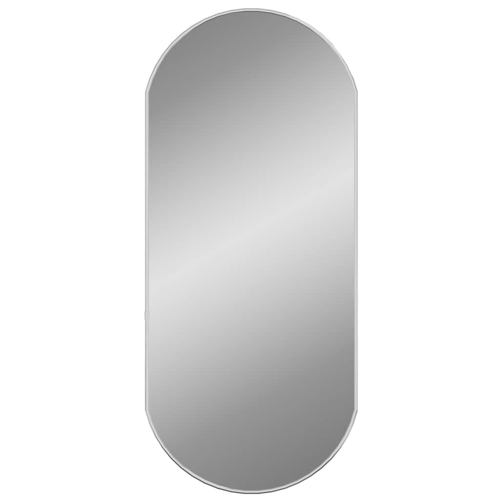 vidaXL Nástěnné zrcadlo stříbrné 80x35 cm oválné