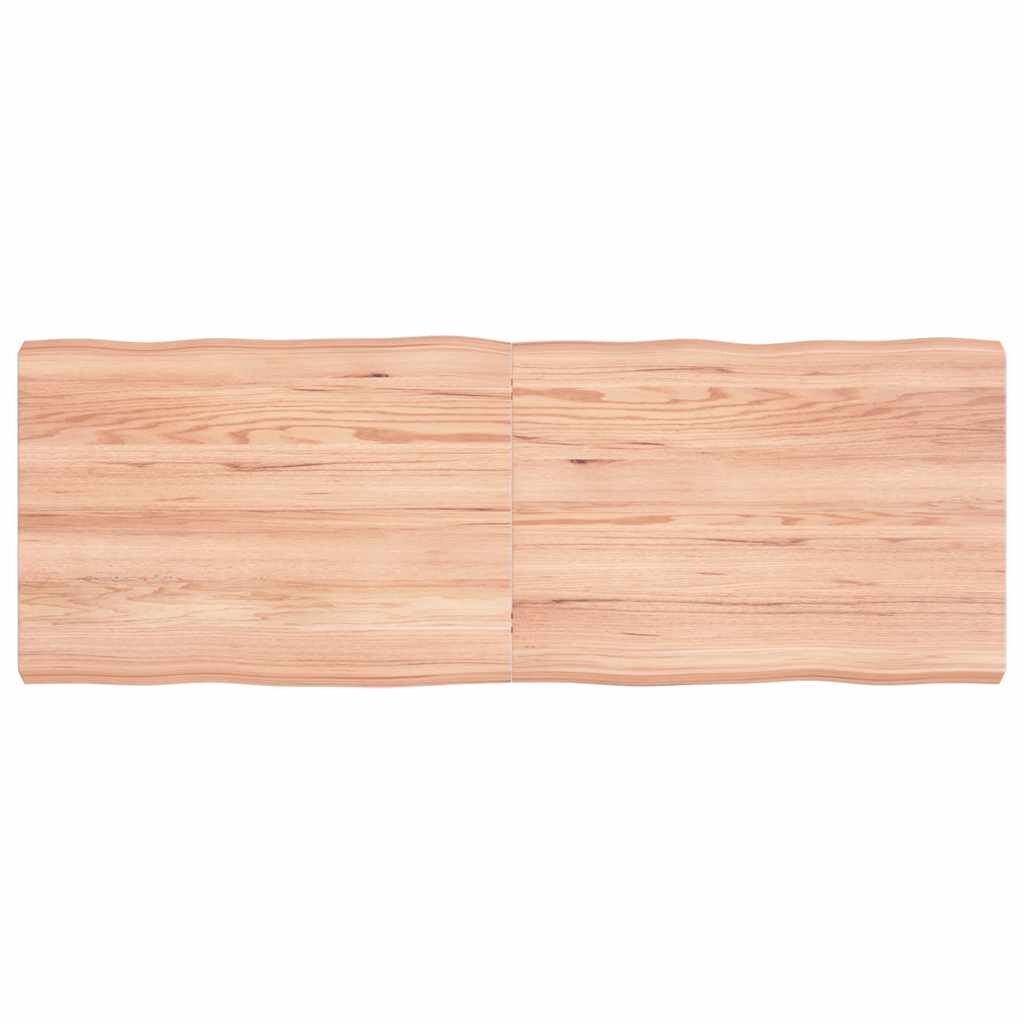 vidaXL Stolní deska hnědá 140x50x(2-6)cm ošetřený dřevo živá hrana